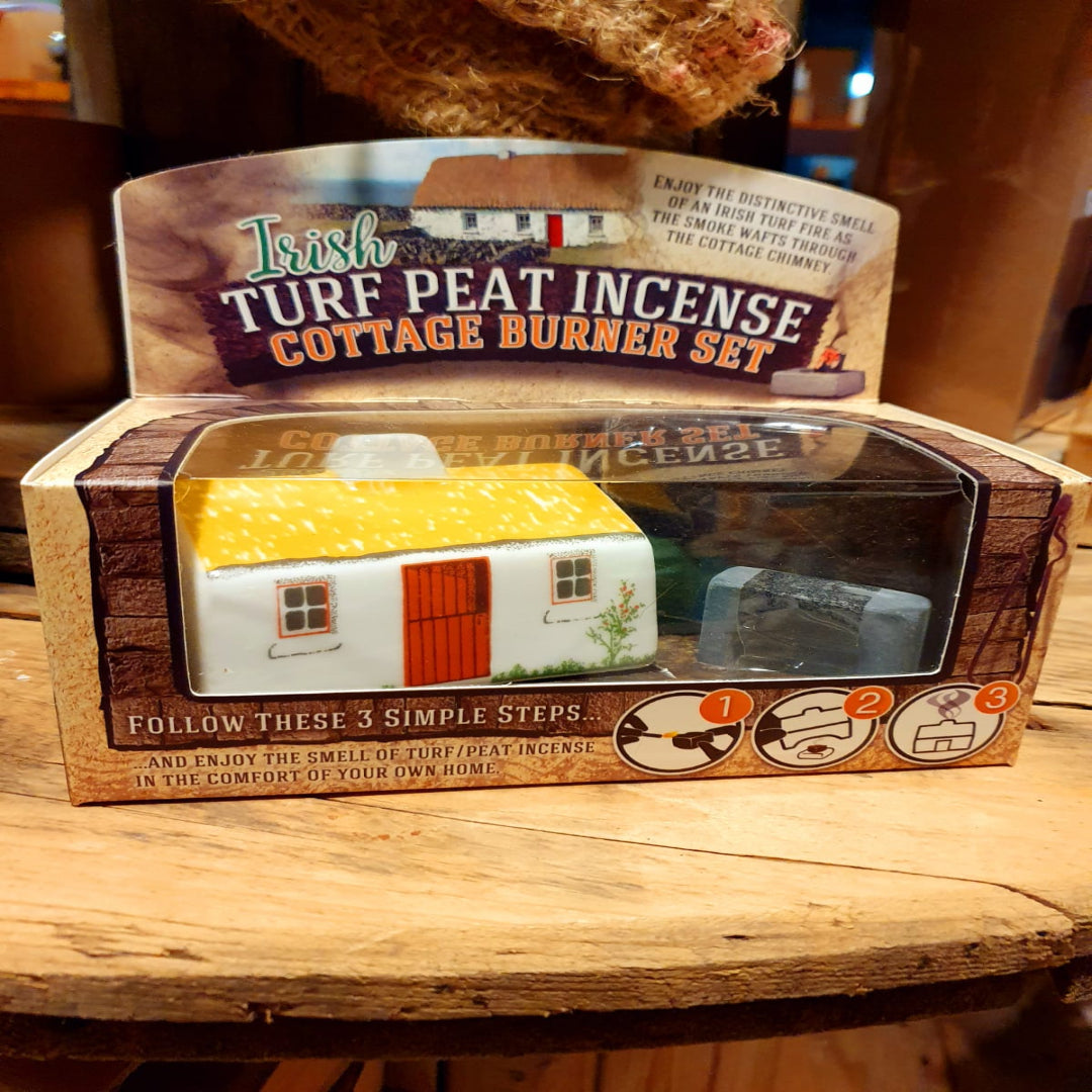 Irish turf peat incense cottage burner set packaging on a wooden surface