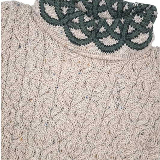 Close-up of Celtic knot design on high collar of oatmeal Aran sweater