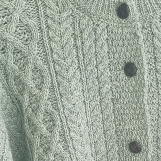 Detail of Sage Marl Clover Cropped Aran Cardigan – honeycomb and cable stitches