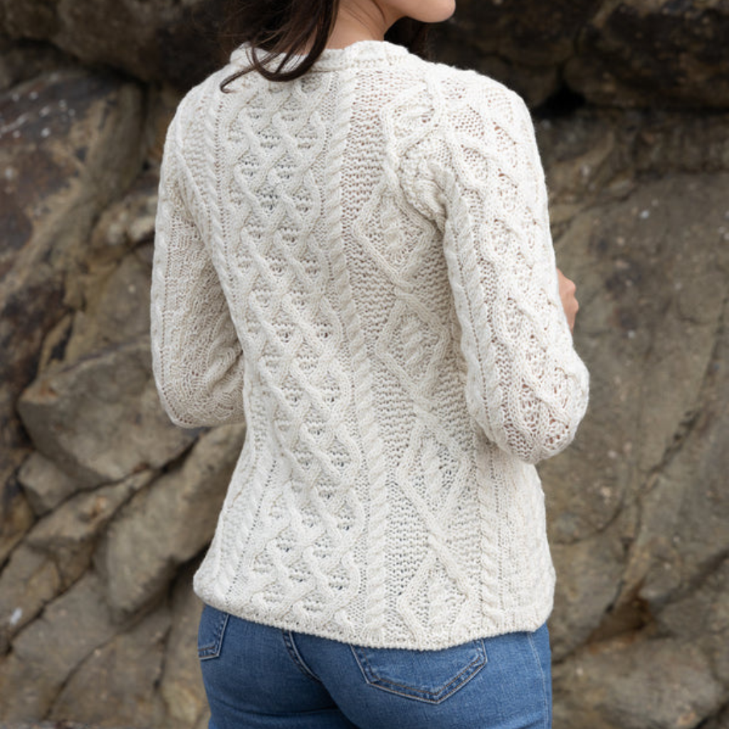 Back view of Lambay Lattice Cable Aran Sweater in Cream, women’s Merino wool knit