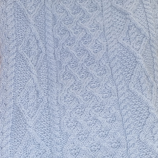 Close-up of Lambay Lattice Cable Aran Sweater in Morning Sky showing cable and lattice stitches