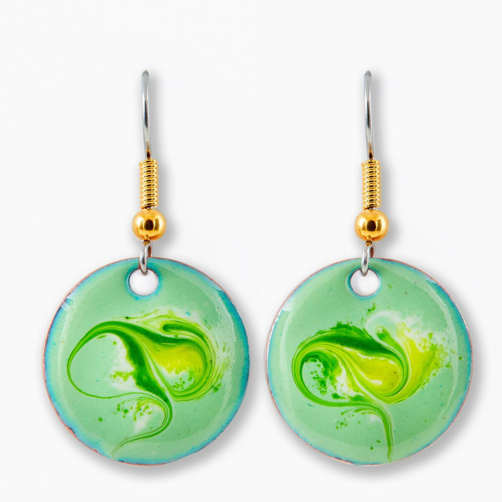 Close up of Strandhill Pistachio Green Drop Earrings with enamel design