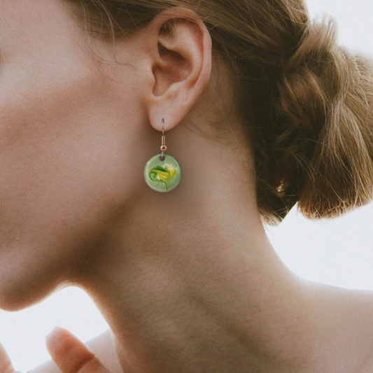 Woman wearing Strandhill Pistachio Green Drop Earrings, handmade in Ireland