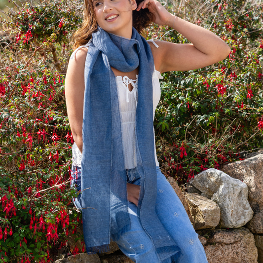 Woman wearing McNutt denim Irish linen scarf outdoors