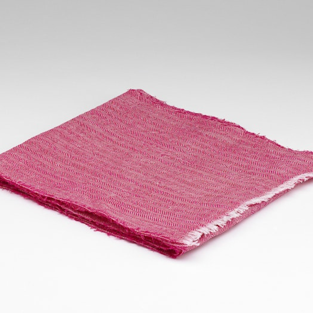 Folded McNutt fuschia herringbone Irish linen scarf with fringed edge