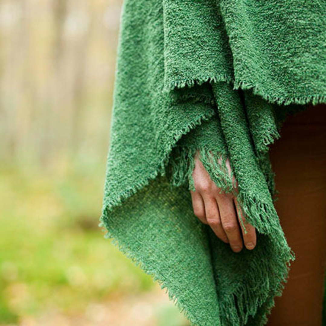 Detailed view of the Irish Wool Ruana Cape draped at the side, highlighting the weave and finish.