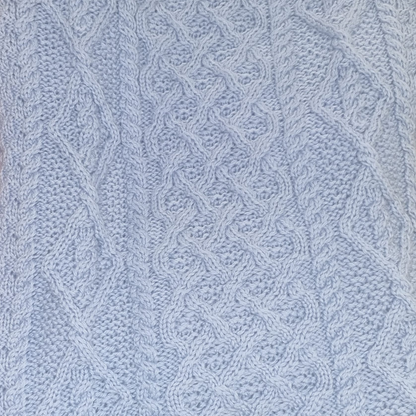 Close-up of Lambay Lattice Cable Aran Sweater in Morning Sky showing cable and lattice stitches