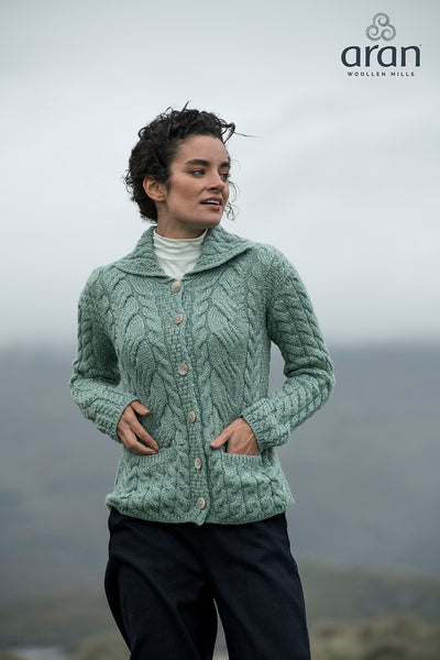 Woman wearing a Light Green Aran Sweater for 