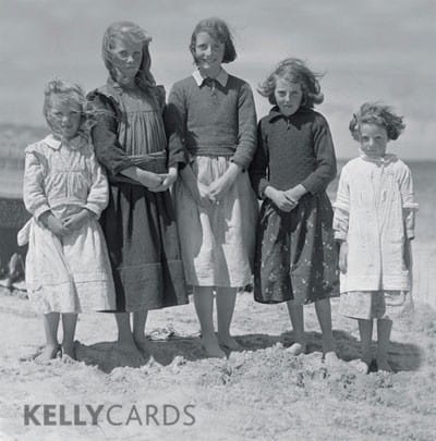 Black and White Postcard of a family at the beach